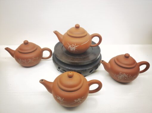 Four red clay teapot set